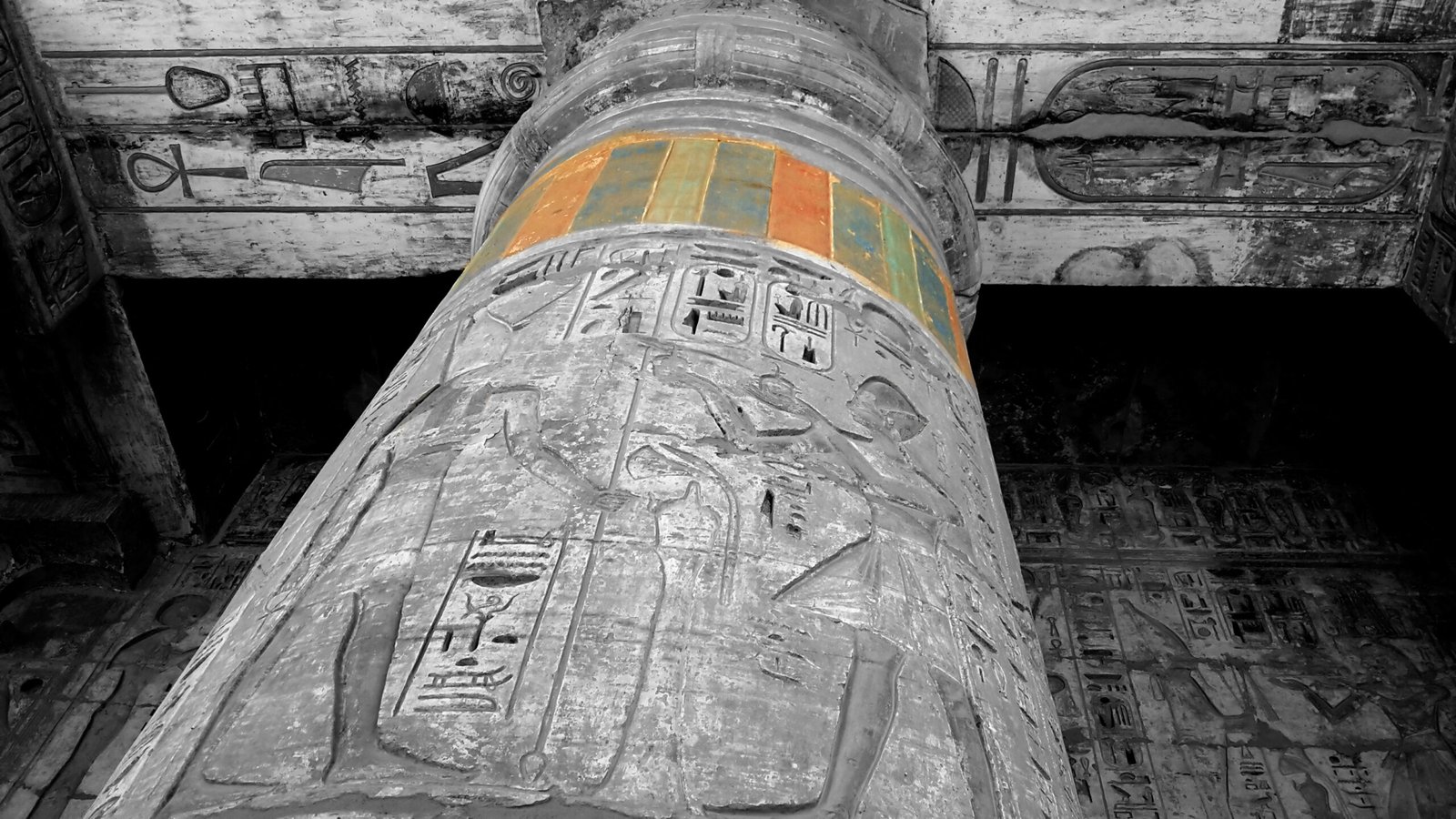 Colored reliefs and architecture at Medinet Habu, temple of Ramses III