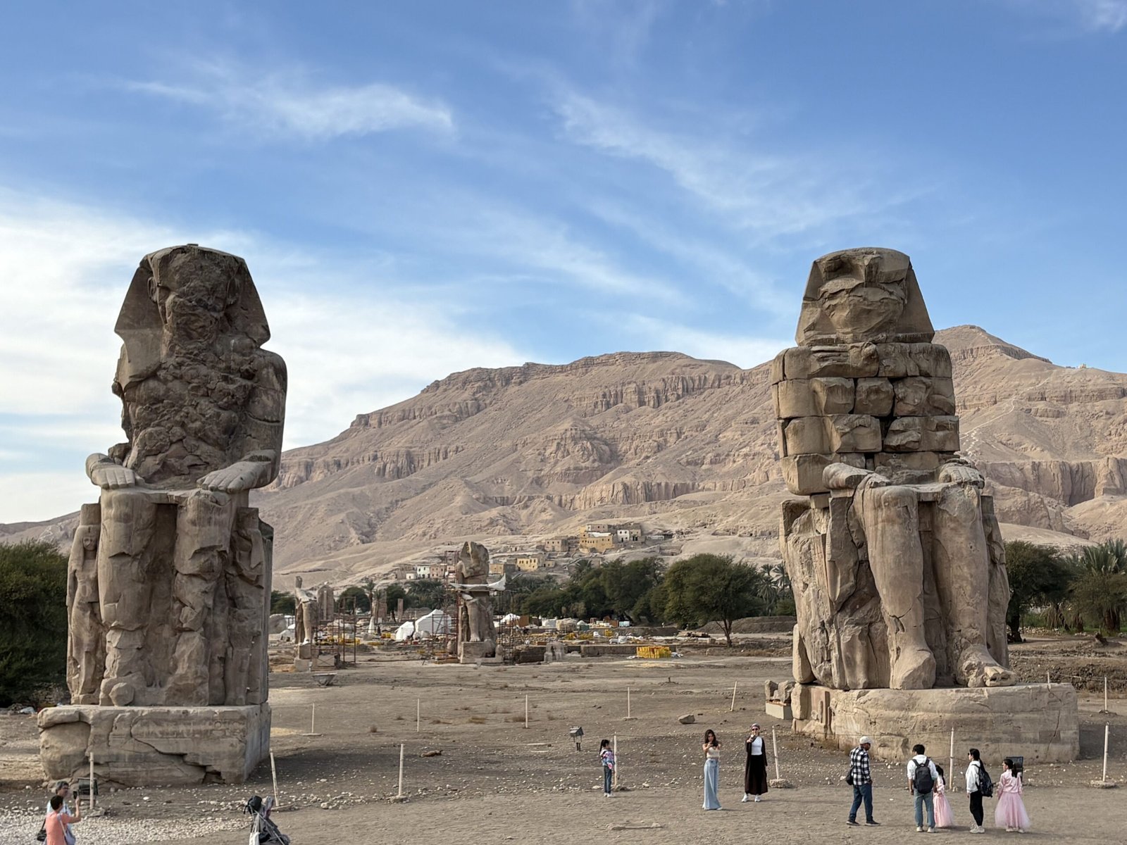 Wide view of the Colossi of Memnon on Luxor's West Bank
